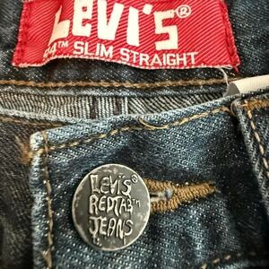 Vintage Levi's 514 Slim Straight Jeans Distressed Red Tab 28x28